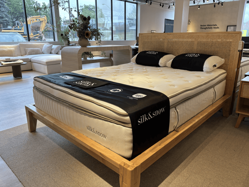 Silk & Snow Reserve Down Pillow on a Mattress